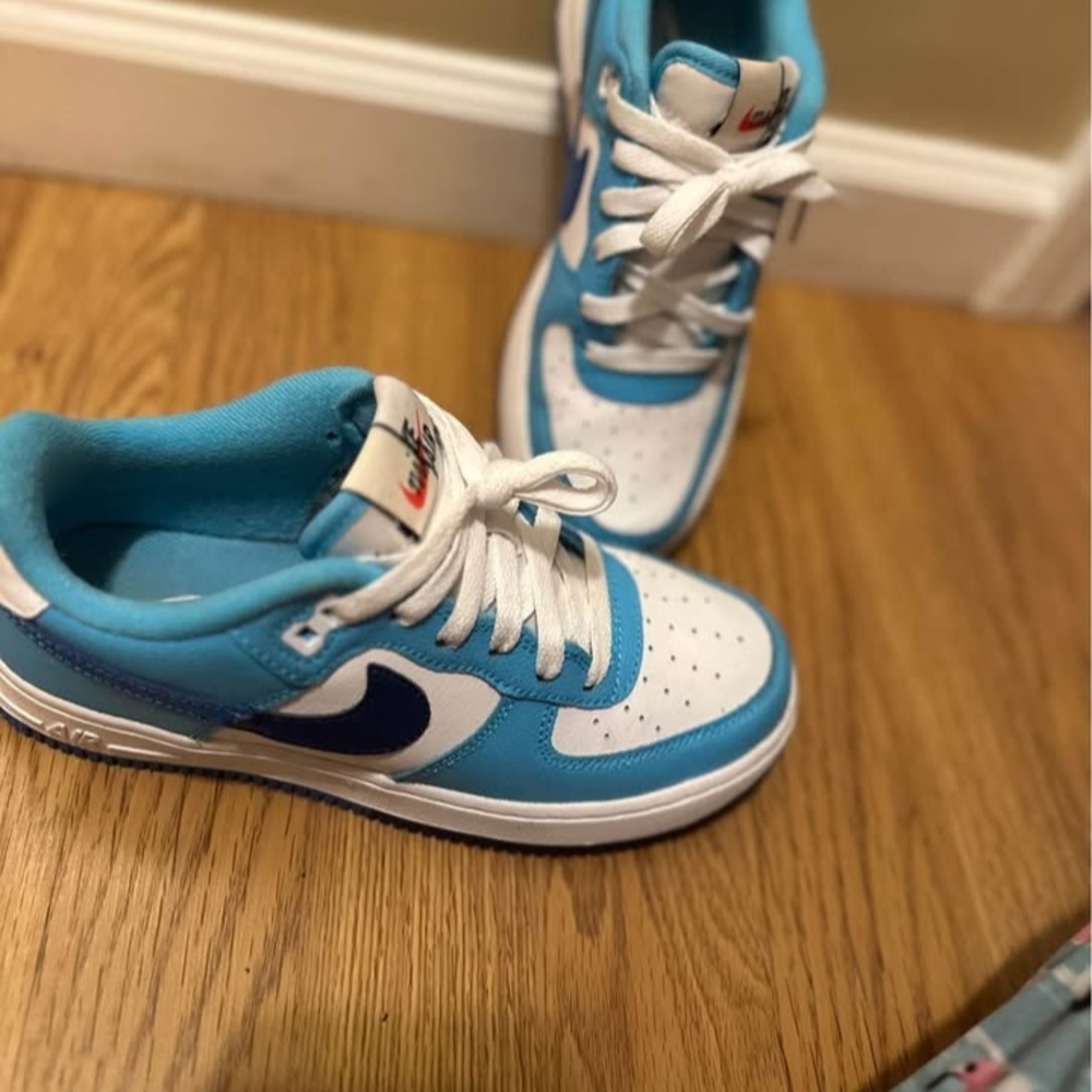 Nike Blue and White Sneakers with Iconic Swoosh